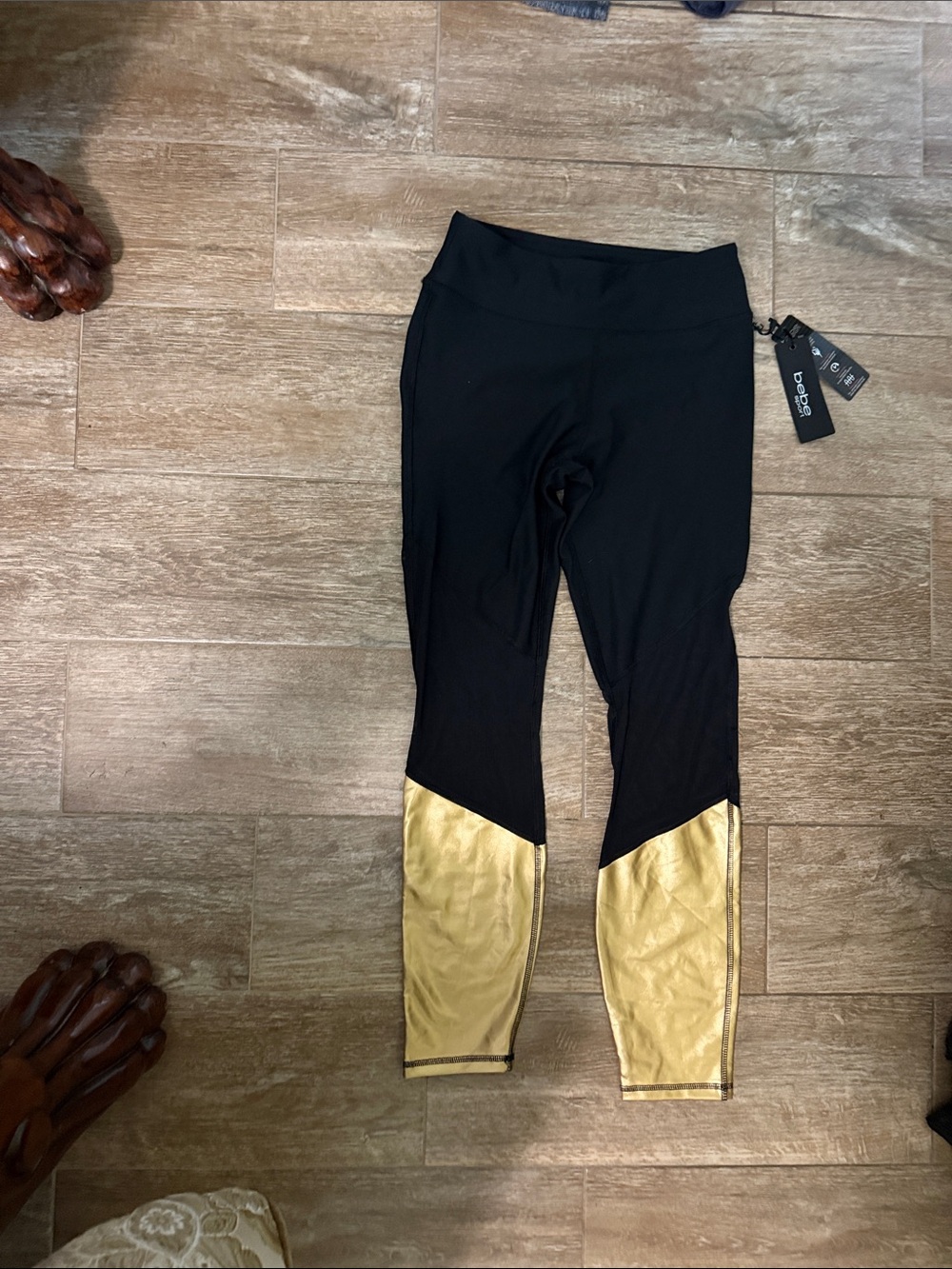 bebe Black Leggings with Gold Lower Panels